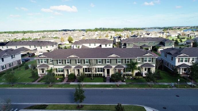 Aerial view of Waterleigh townhomes and single-family homes