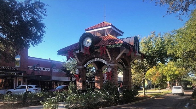A view of Winter Garden, Florida, with the West Orange Trail in the foreground