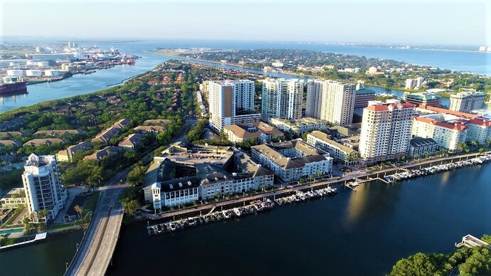 Scenic waterfront view with boats and city skyline in Tampa FL