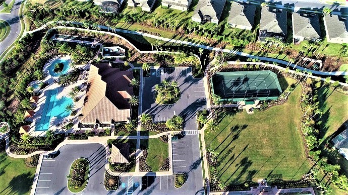 Aerial view of Esplanade at Highland Ranch community with rolling hills and luxurious single-family homes