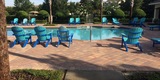 Community Pool and Chairs in The Enclave Windermere